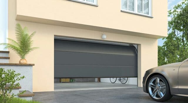 Porte de garage qui s'ouvrant automatiquement - PROP ASSUR IT & Telecom Solutions in Benin, Togo, and Africa